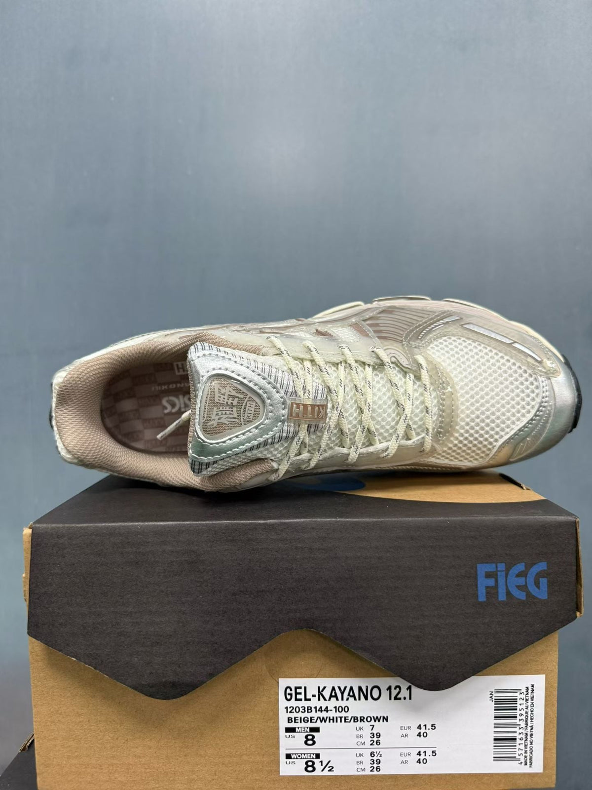 Nike Zoom Vomero 5 Sneakers in Beige White Brown 1203B144-100 - product image from the listing.