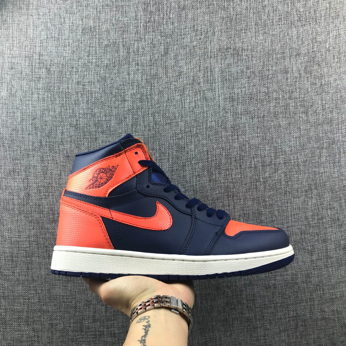 Air Jordan 1 Mid Sneakers in Blue Orange AH7389-408 - product image from the listing.