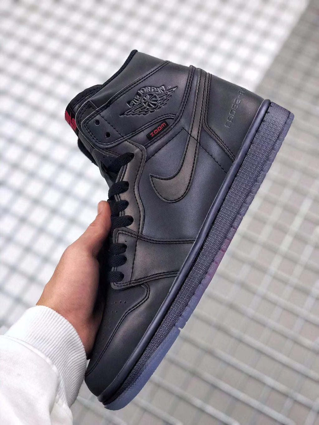 Air Jordan 1 High Zoom R2T Chameleon Sneakers in Black - product image from the listing.