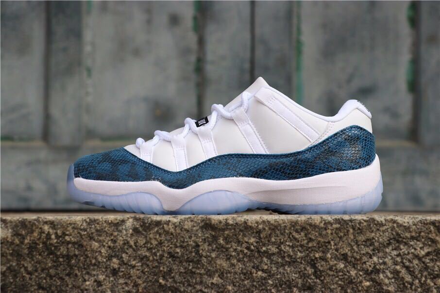 Navy Snakeskin Sneakers - Air Jordan 11 Low - product image from the listing.