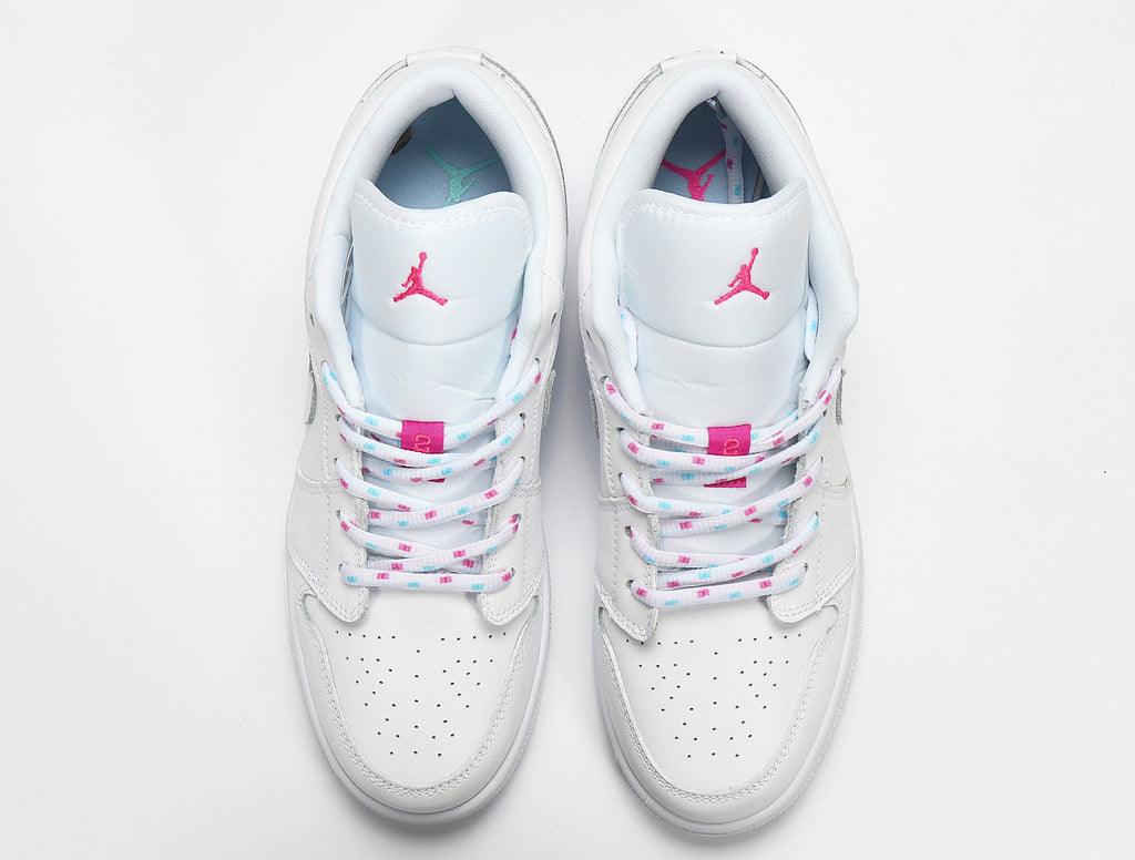 Air Jordan 1 Low White and Pink Sneakers - product image from the listing.