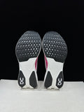 On Cloudboom Strike LS Running Sneakers in White/Pink - product image from the listing.