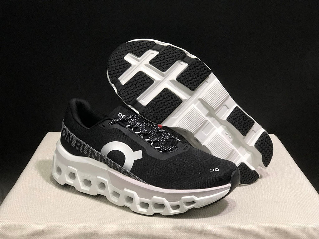 On Cloudmonster 2 Running Shoes in Black White - product image from the listing.