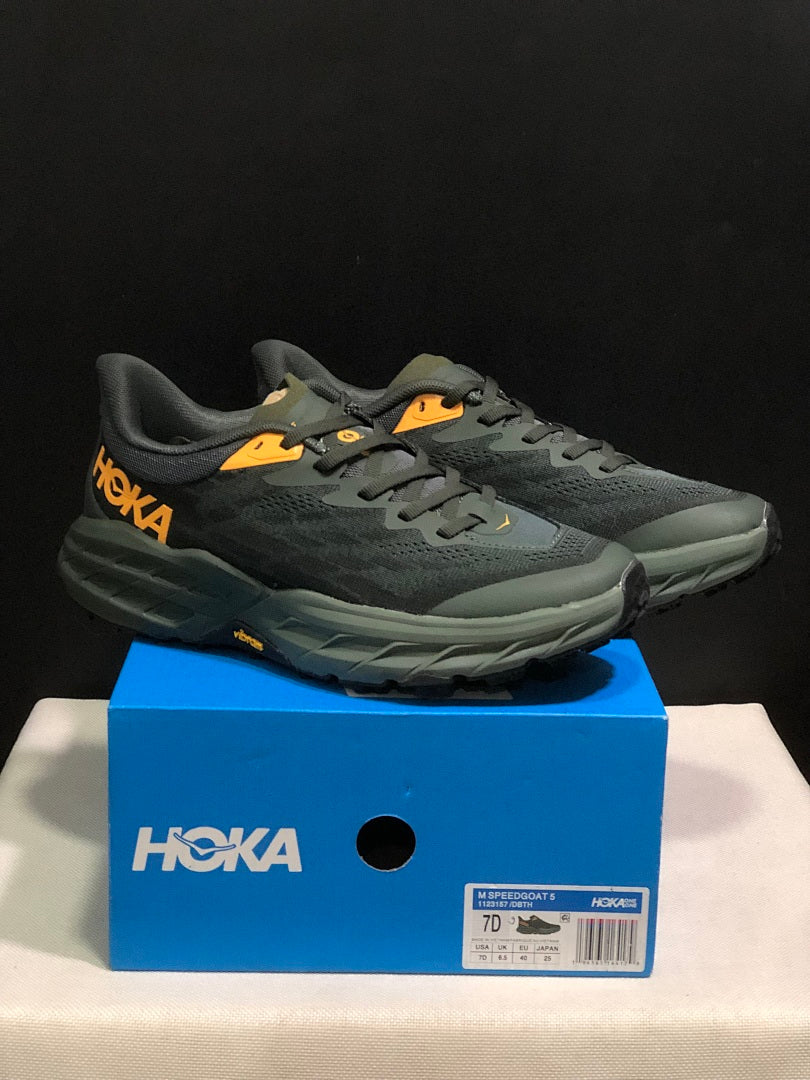 HOKA Speedgoat 5 Trail Running Shoes, in Black and Olive - product image from the listing.