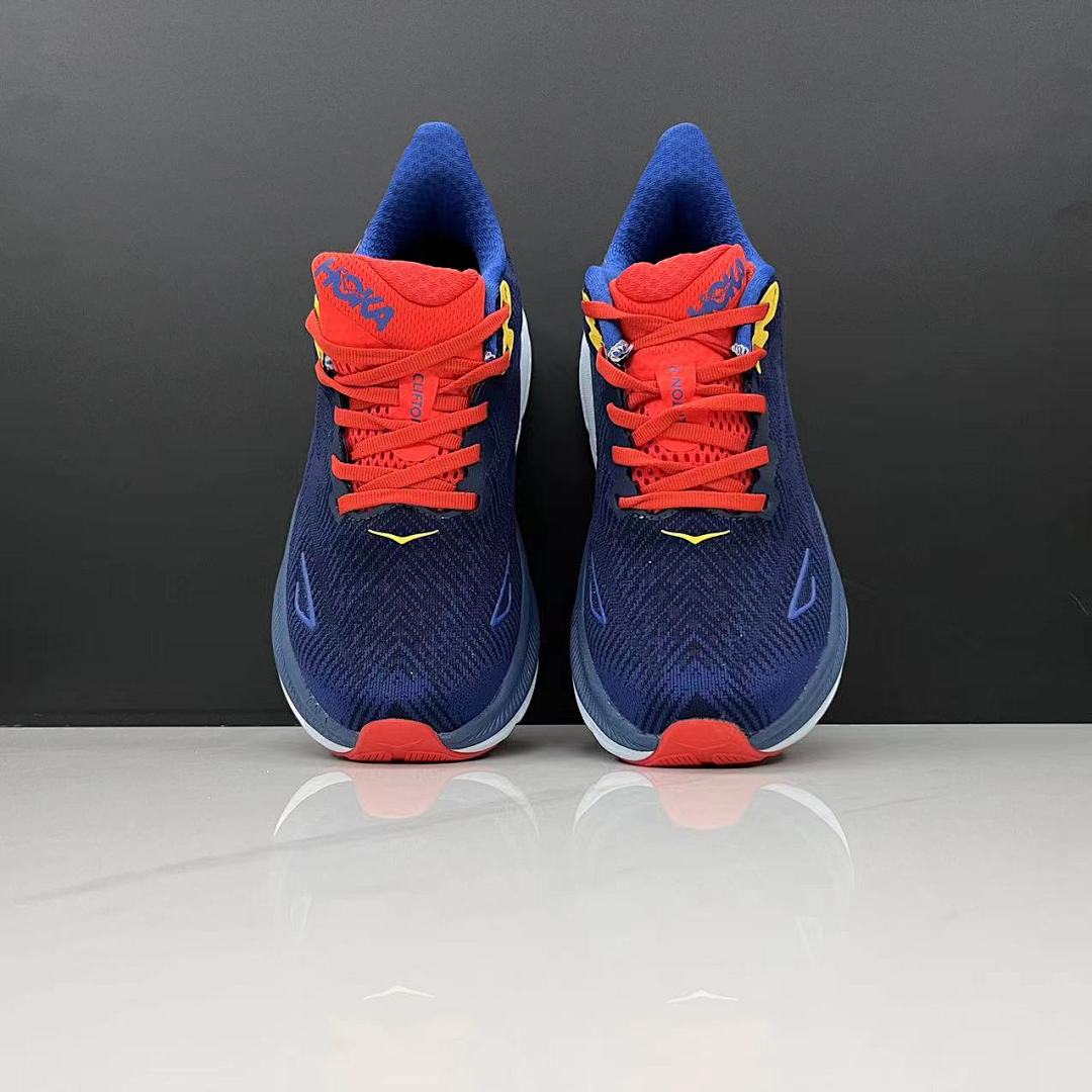 HOKA Clifton 9 Running Shoes in Navy, in Red and Yellow - product image from the listing.
