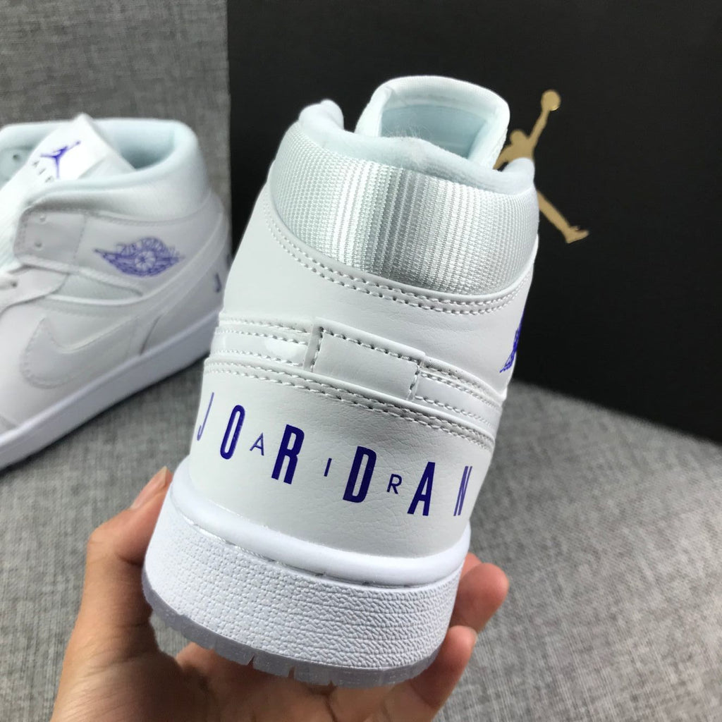 White Sneakers with Translucent Outsole - Air Jordan 1 Mid - product image from the listing.