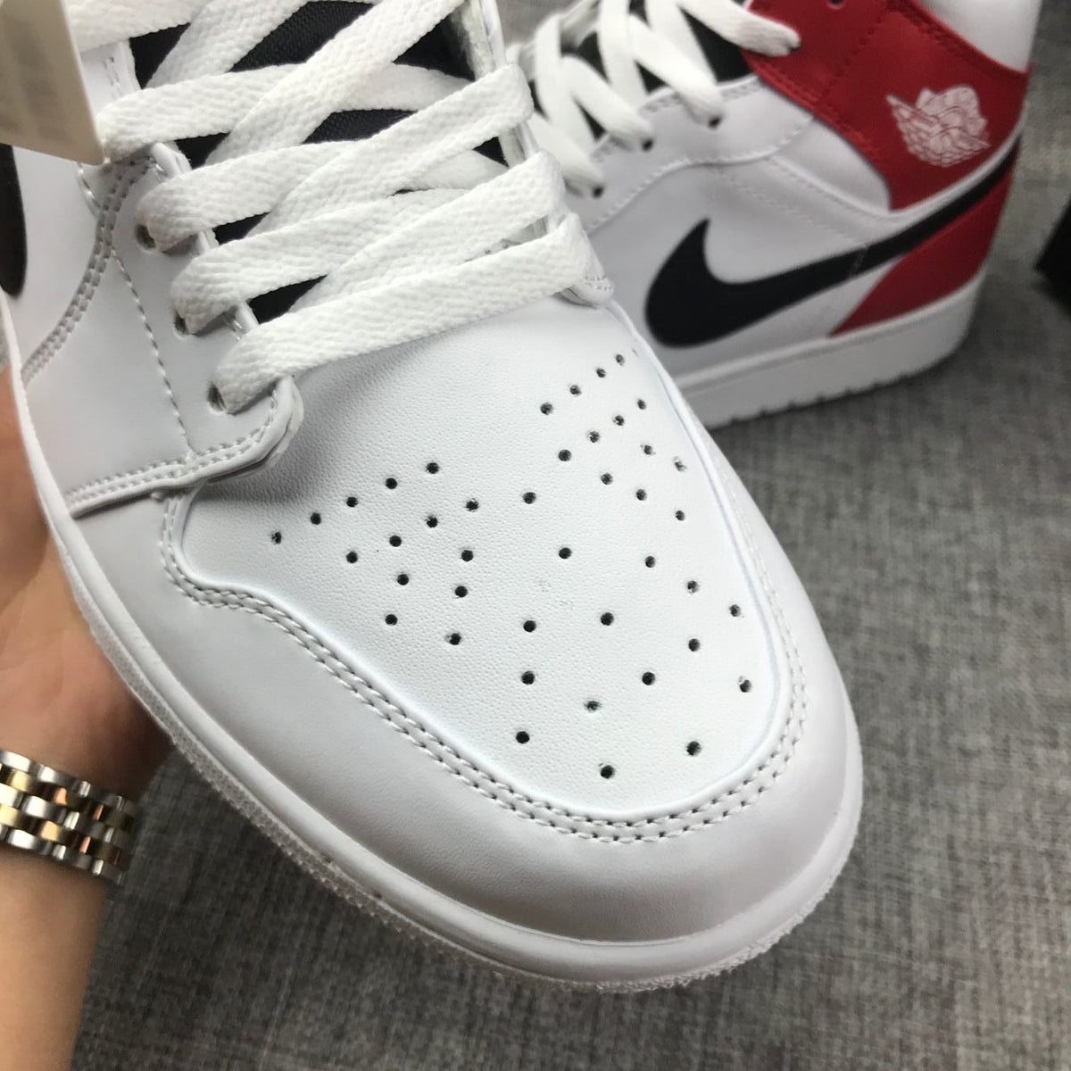 Air Jordan 1 Mid Sneakers in White Red 554724-116 - product image from the listing.