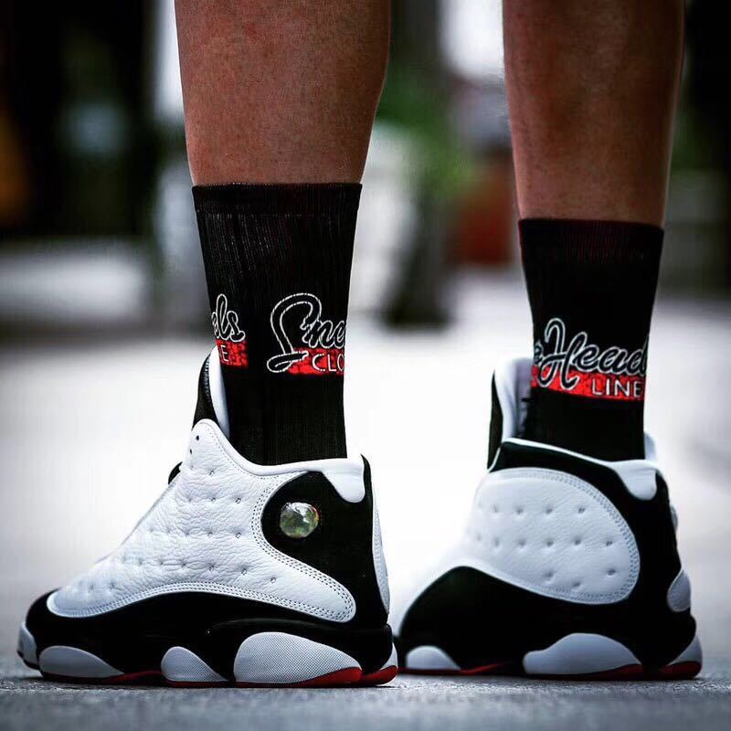 Air Jordan 13 He Got Game Sneakers in Black White Red - product image from the listing.