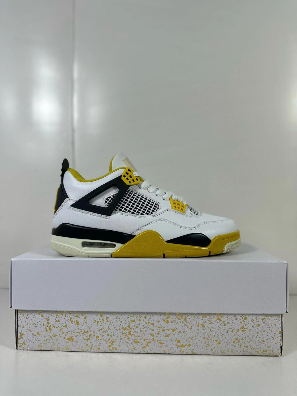 Air Jordan 4 Vivid Sulfur Sneakers White Yellow AQ9129-101 - product image from the listing.