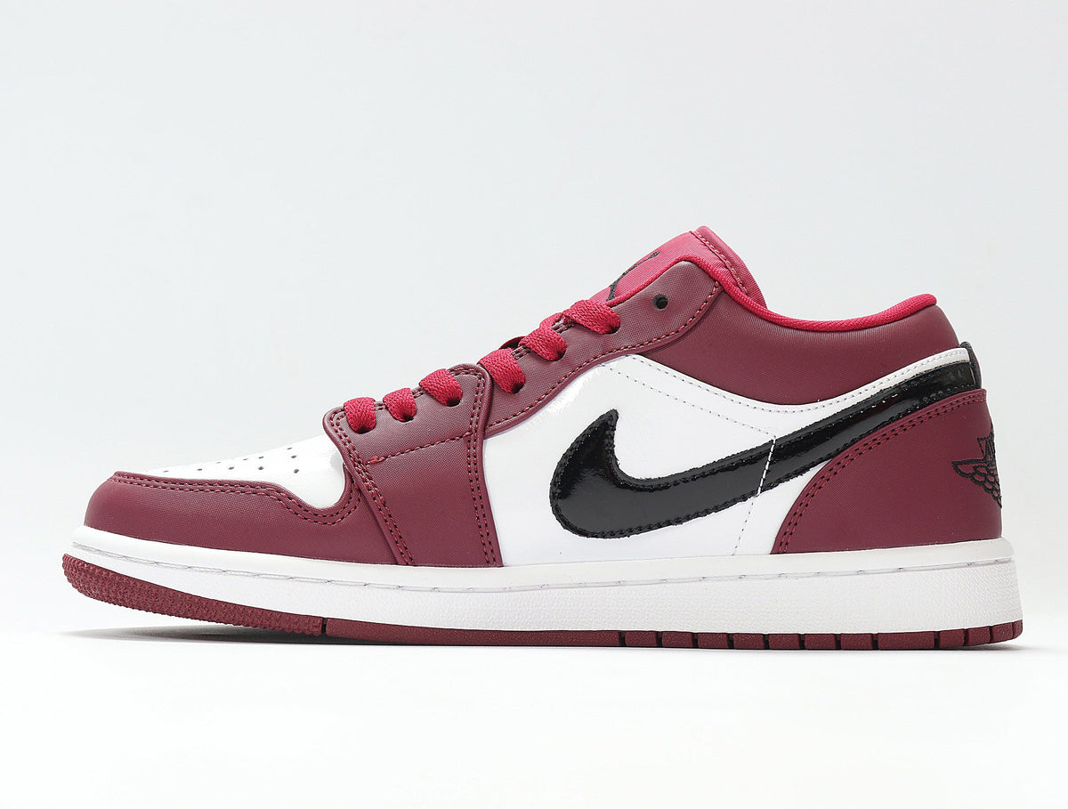 Air Jordan 1 Low Sneakers in Red and White 553558-604 - product image from the listing.