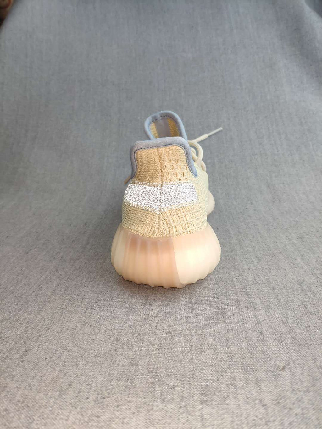 Beige Yeezy Boost 350 V2 Reflective Knit Sneakers - product image from the listing.