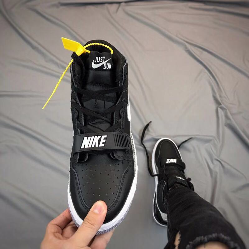Air Jordan Legacy 312 High-Top Sneakers in Black and White - product image from the listing.