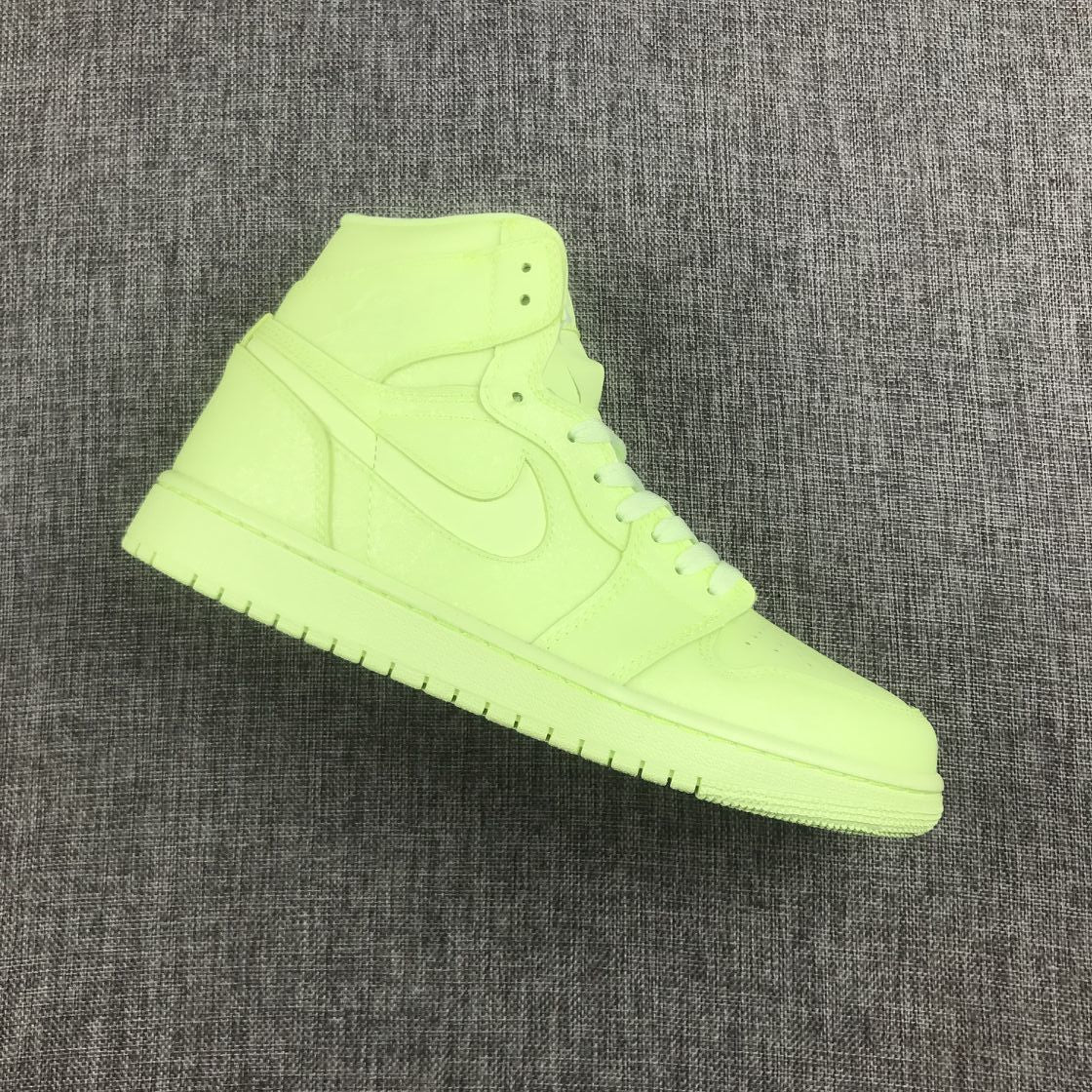 Air Jordan 1 Mid AH7389-700 Sneakers in Volt - product image from the listing.