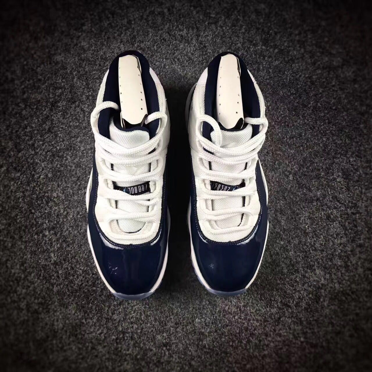 Jordan 11 Georgetown High-Top Sneakers in Navy - product image from the listing.