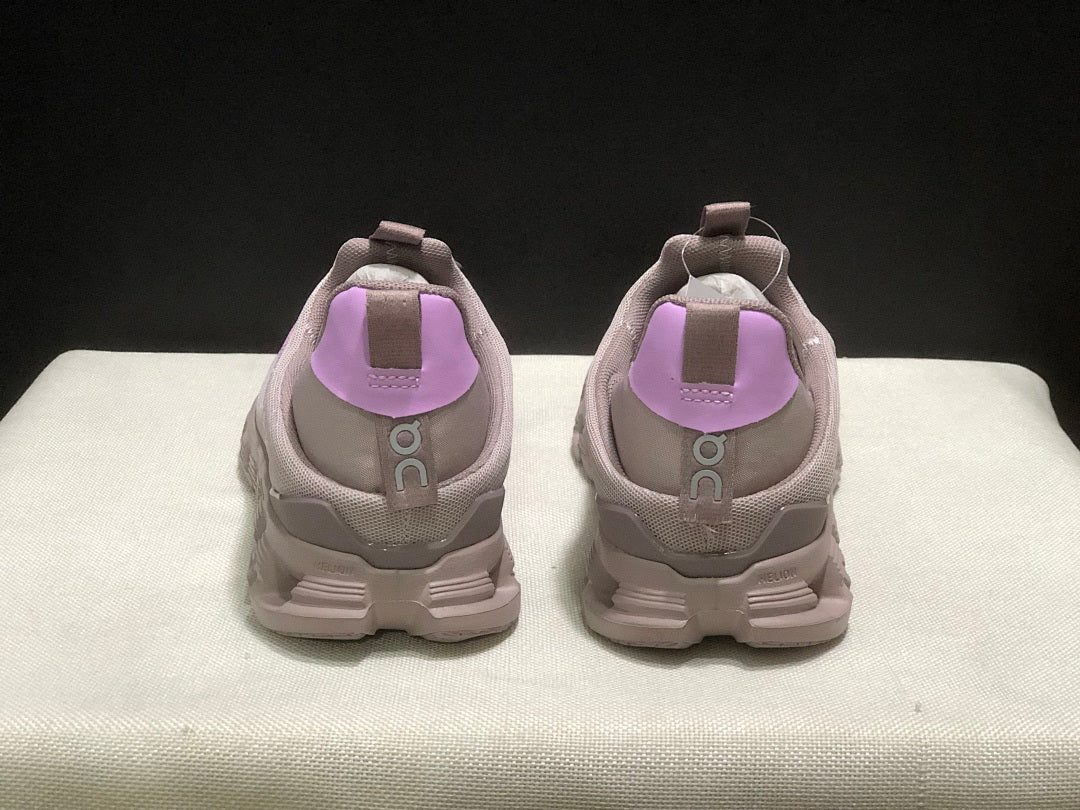 On Cloud 4 Coast Slip-On Trainers Pink/Purple - product image from the listing.