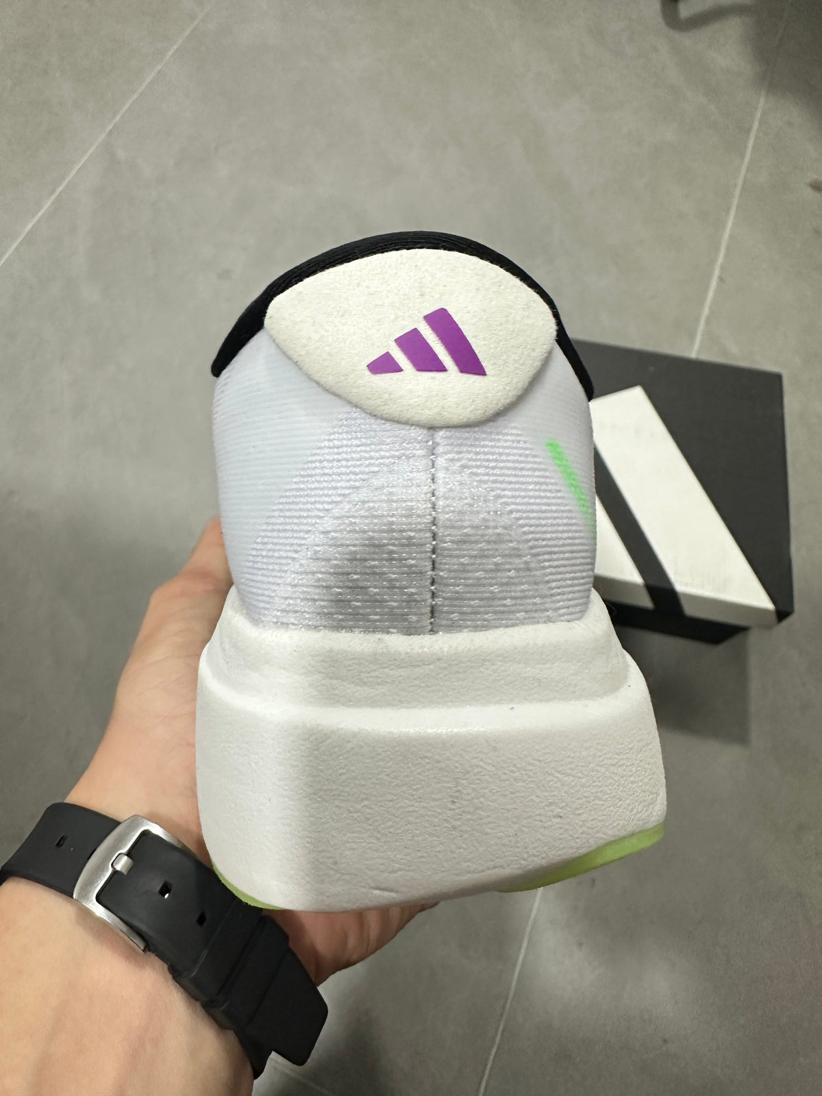 Adizero Lightstrike Pro Running Shoes in White Purple Green - product image from the listing.
