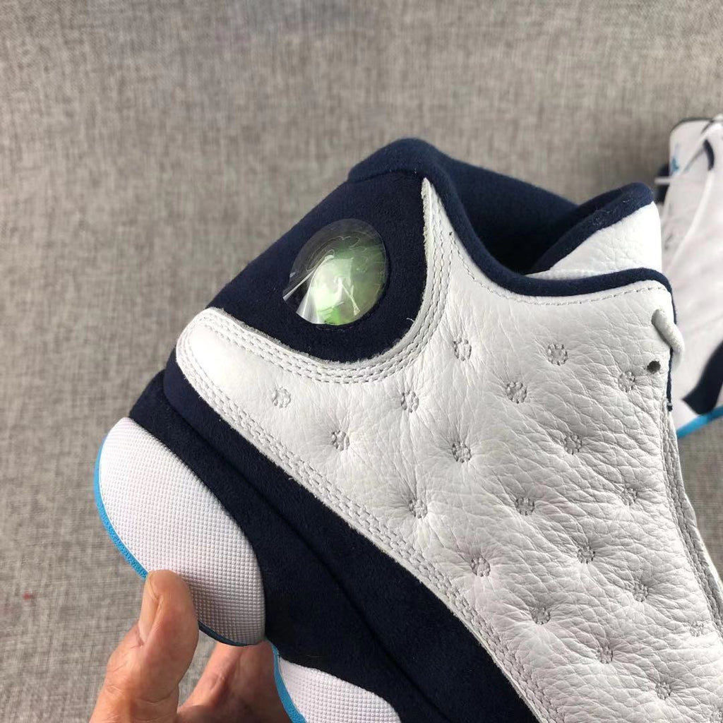 Air Jordan 13 Dark Powder Blue Sneakers White Navy - product image from the listing.