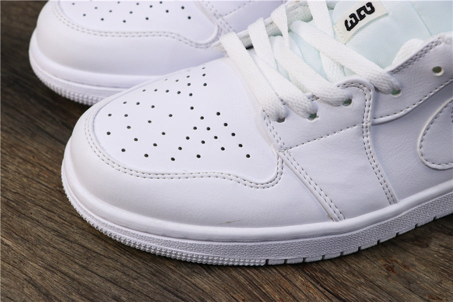 Nike Air Jordan 1 Low Sneakers in White 553560-101 - product image from the listing.