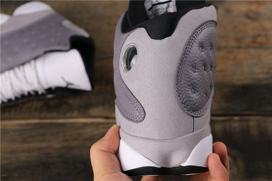 Air Jordan 13 Atmosphere Grey Sneakers 414571-016 - product image from the listing.