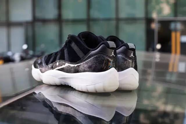 Jordan 11 Retro Low Barons Sneakers in Black White - product image from the listing.