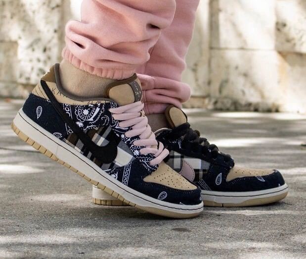 Black and Tan Jordan 1 High Paisley Pattern Sneakers - product image from the listing.