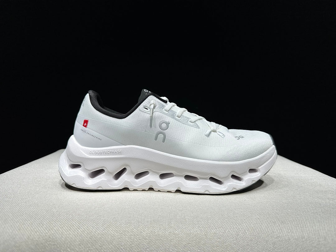 Ivory and Black On Cloudtilt Sneakers - product image from the listing.