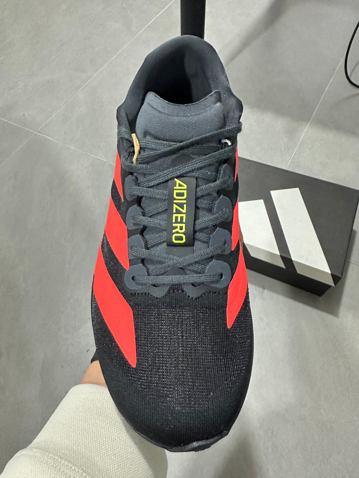 adidas Lightstrike Pro Running Shoes in Black Orange JR3414 - product image from the listing.