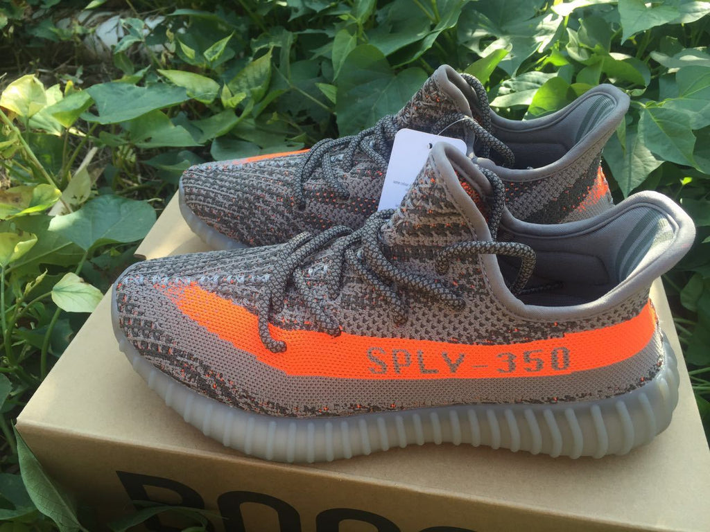 Yeezy 350 V2 Sneakers in Gray and Orange Knit - product image from the listing.
