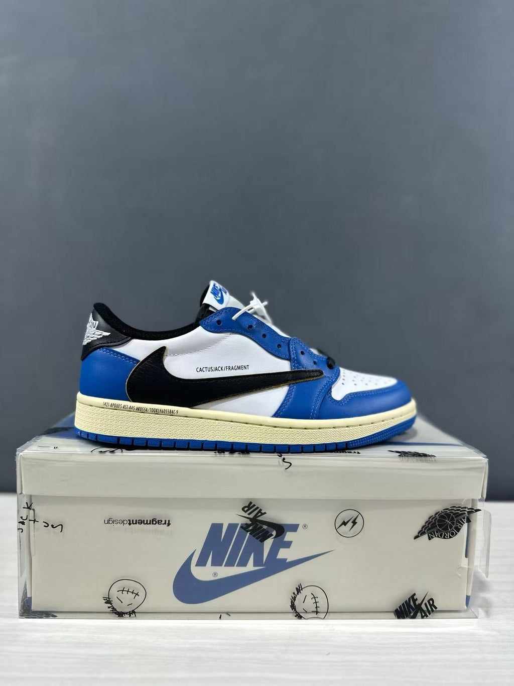 Jordan 1 Low Travis Scott Fragment in Blue White DM7866-141 - product image from the listing.