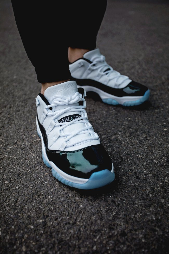 White and Black Air Jordan 11 Iridescent Sneakers - product image from the listing.