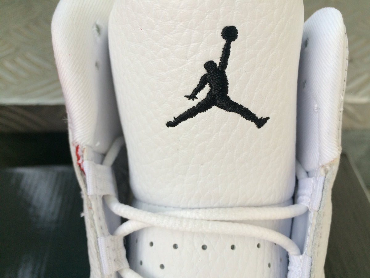 Air Jordan 13 Sneakers in White Red Black - product image from the listing.