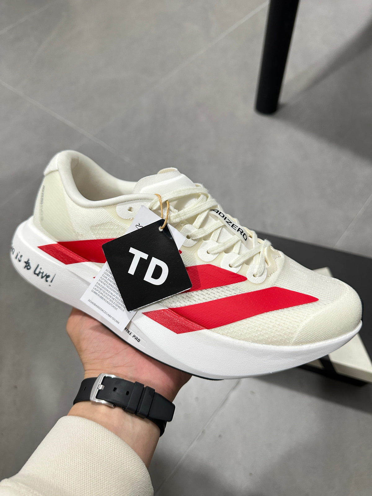 adidas Adizero Lightstrike Pro Running Shoes in White Red - product image from the listing.