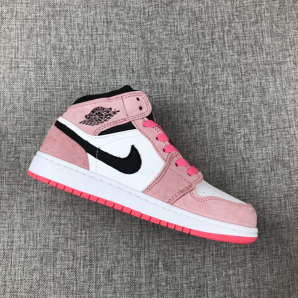 Air Jordan 1 Mid Sneakers in Pink 852542-801 - product image from the listing.