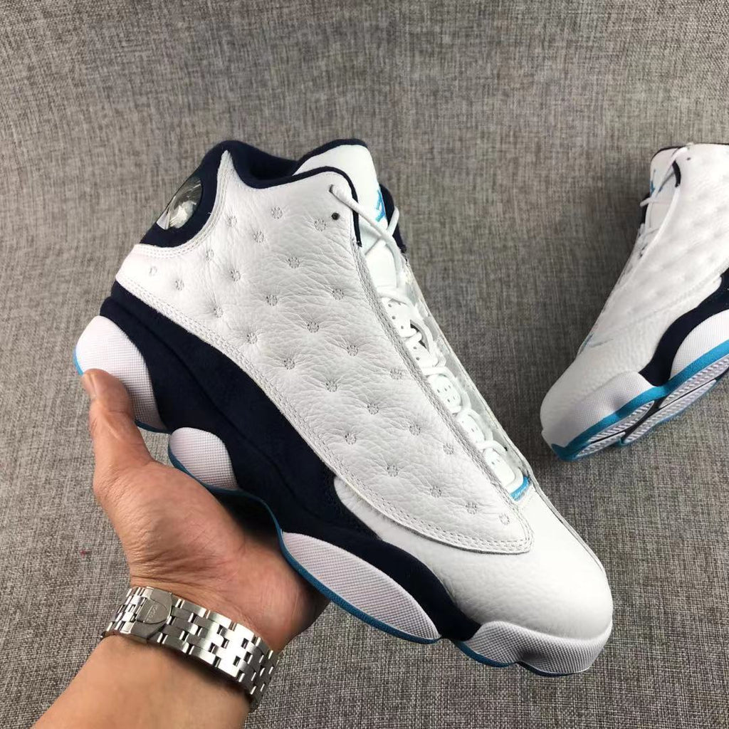 Air Jordan 13 Dark Powder Blue Sneakers White Navy - product image from the listing.