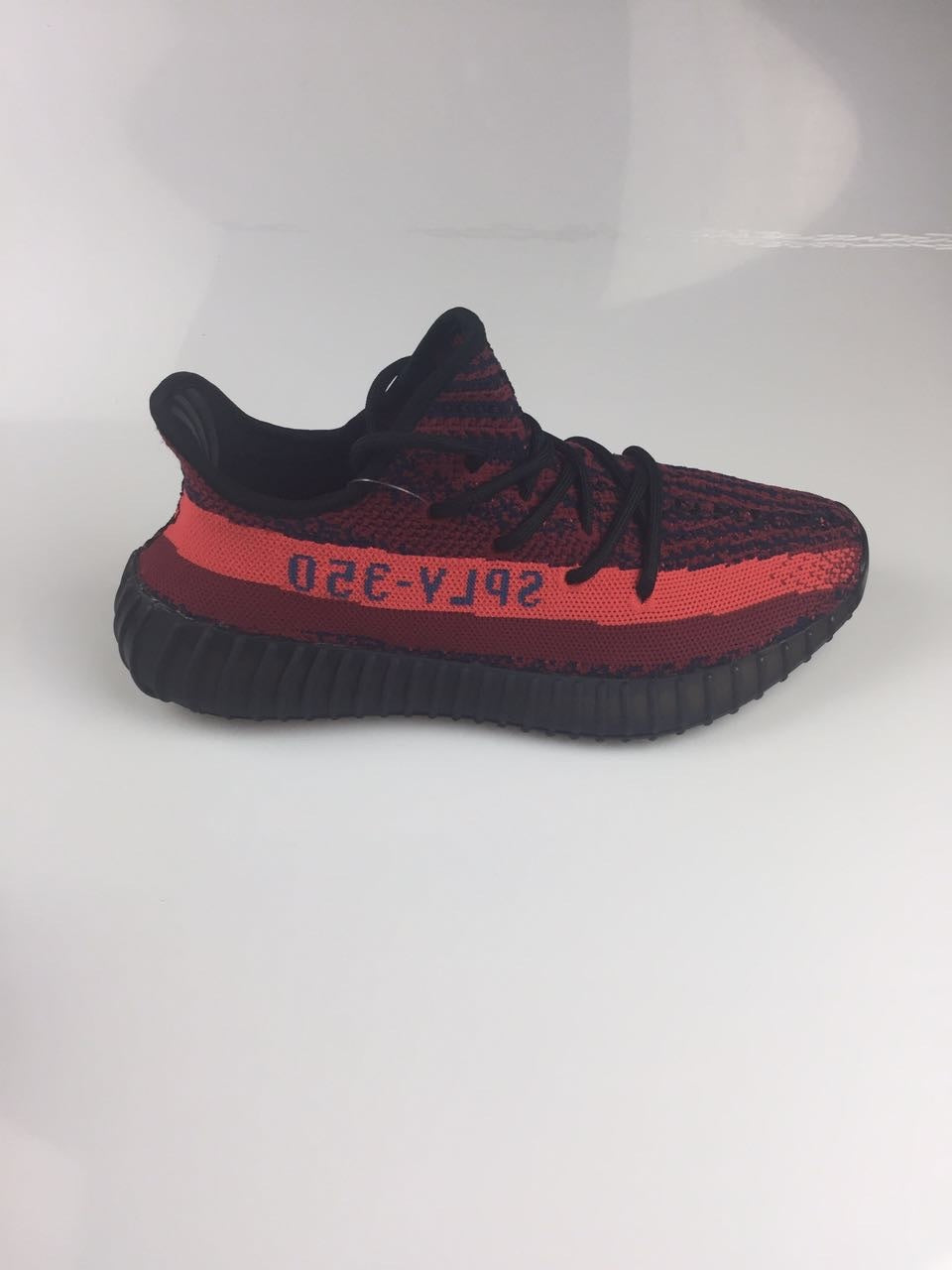 Adidas Yeezy Boost 350 V2 Sneakers in Black and Burgundy - product image from the listing.