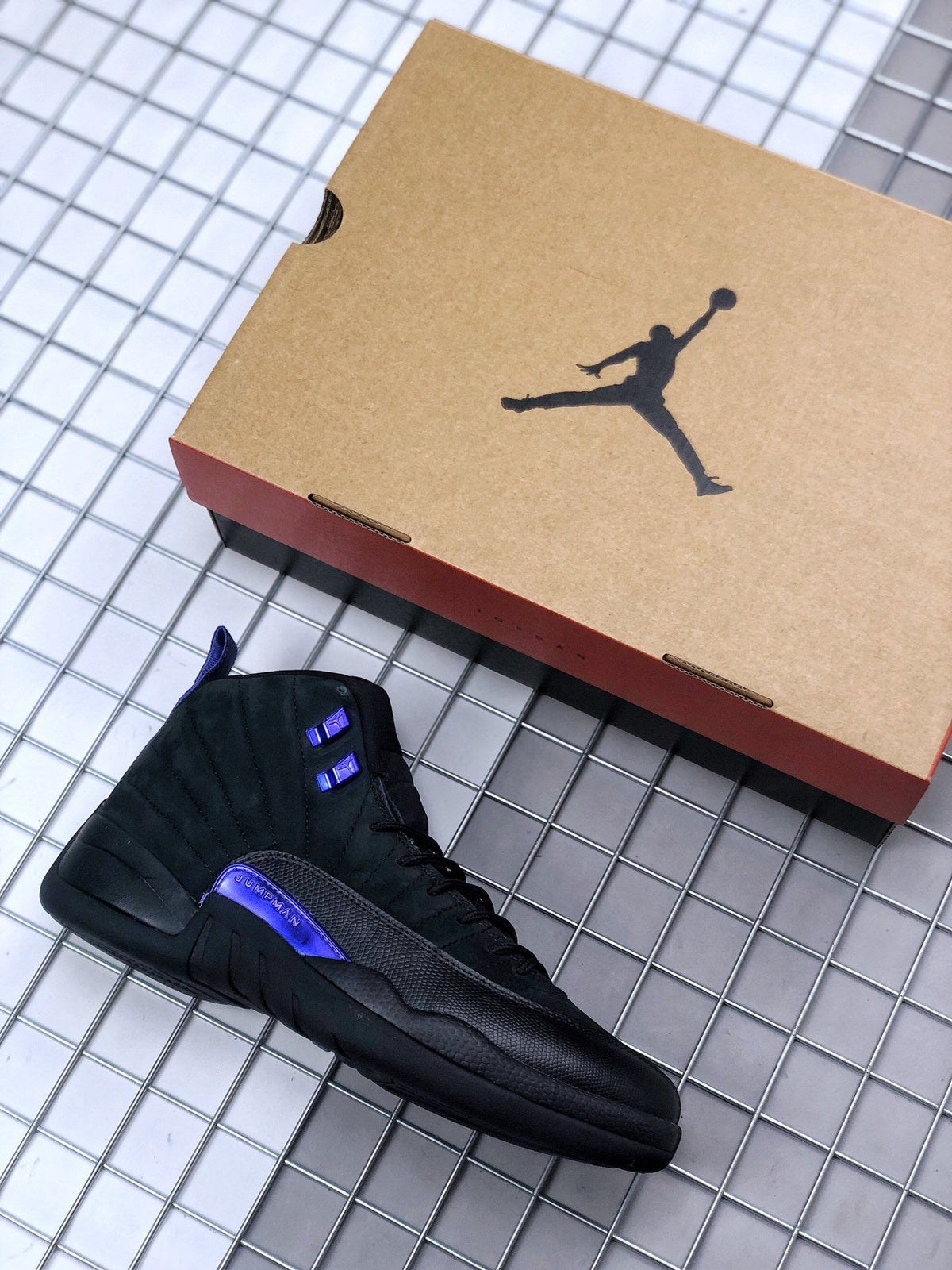 Air Jordan 12 Dark Concord Sneakers CT8013-005 - product image from the listing.