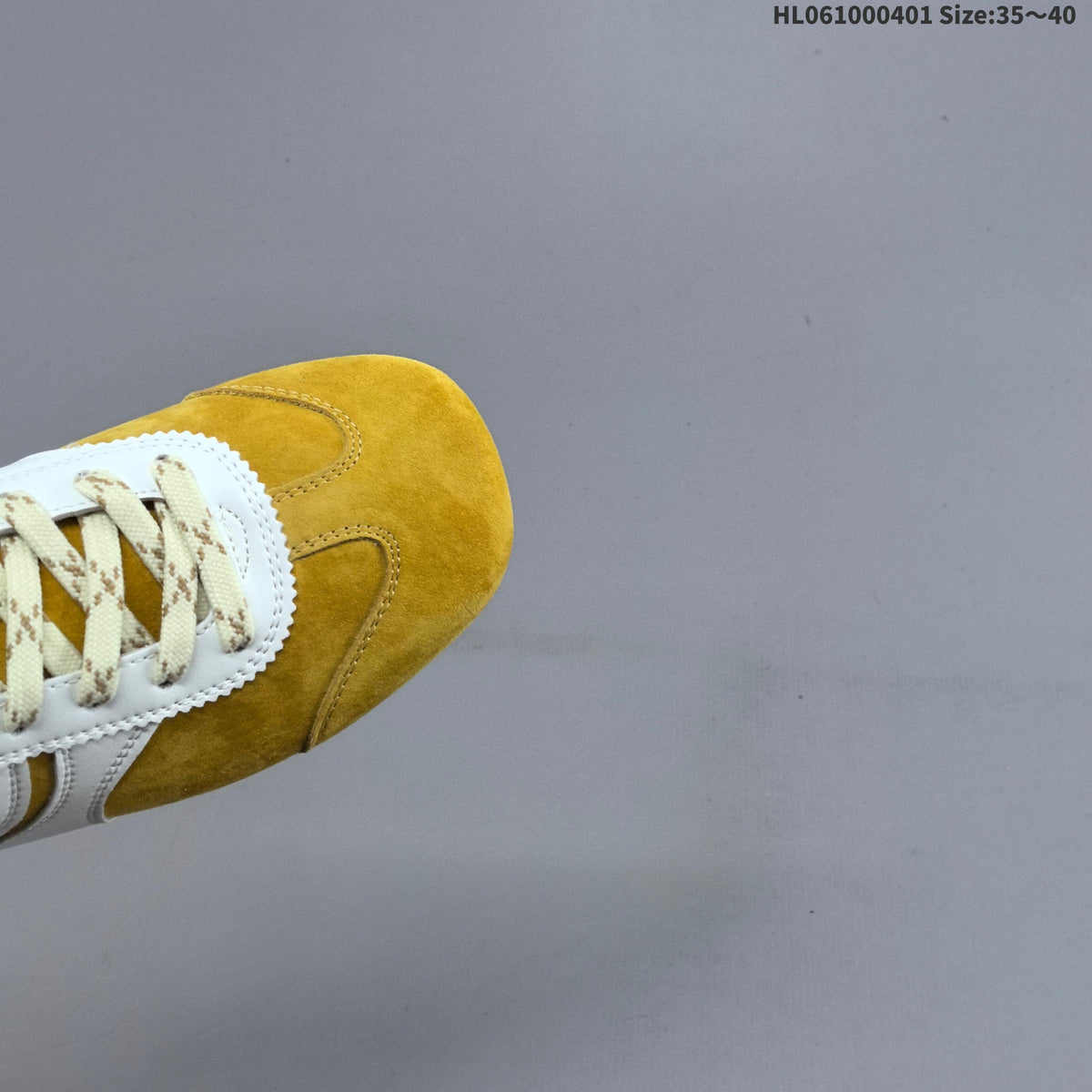 Women's GG Yellow and White Suede-Style Lace-Up Sneakers - product image from the listing.