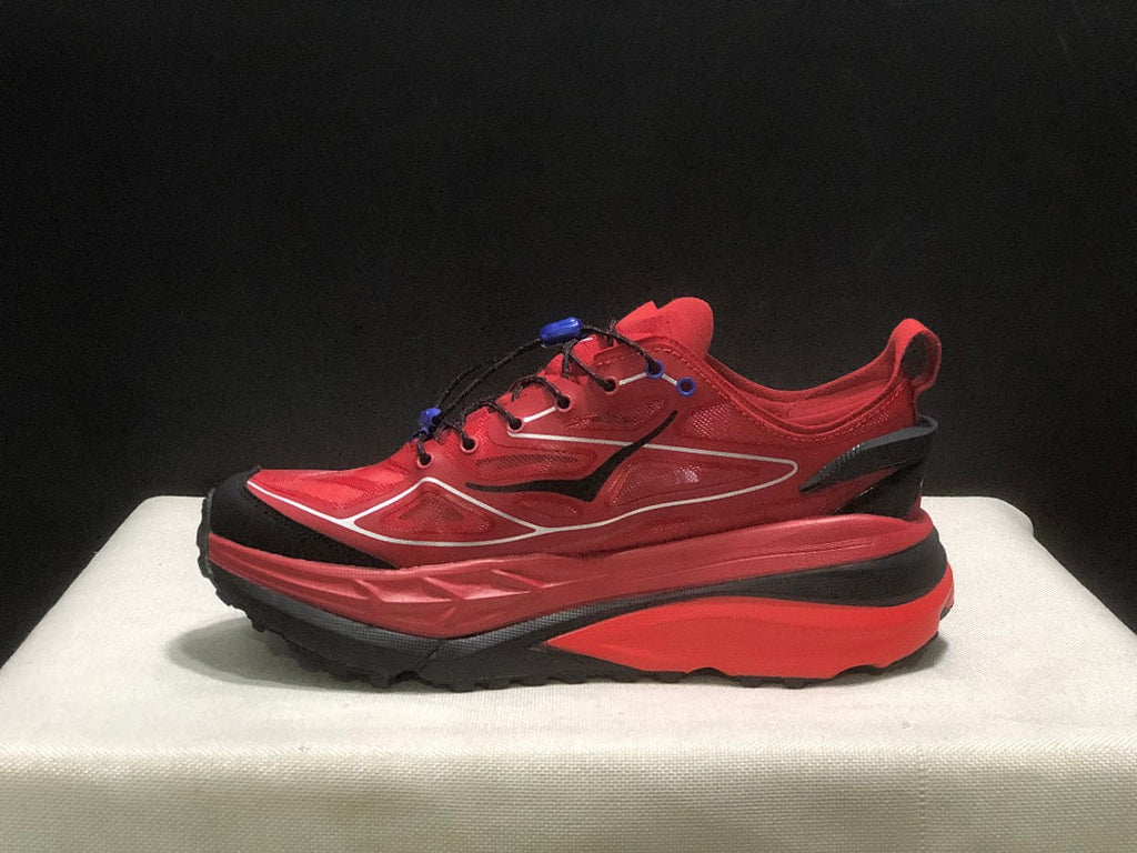 Red HOKA Stinson One 7 Trail Sneakers - product image from the listing.