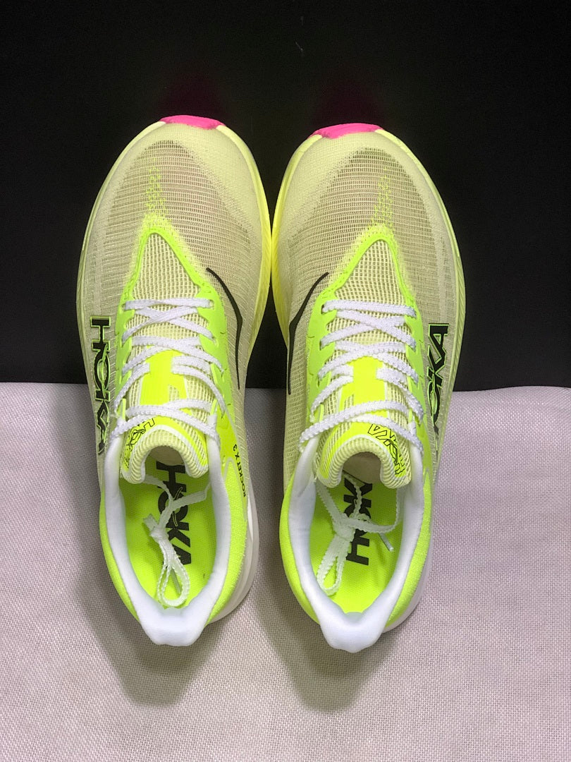 HOKA Rocket X 3 Running Shoes in Neon in Yellow and Pink - product image from the listing.