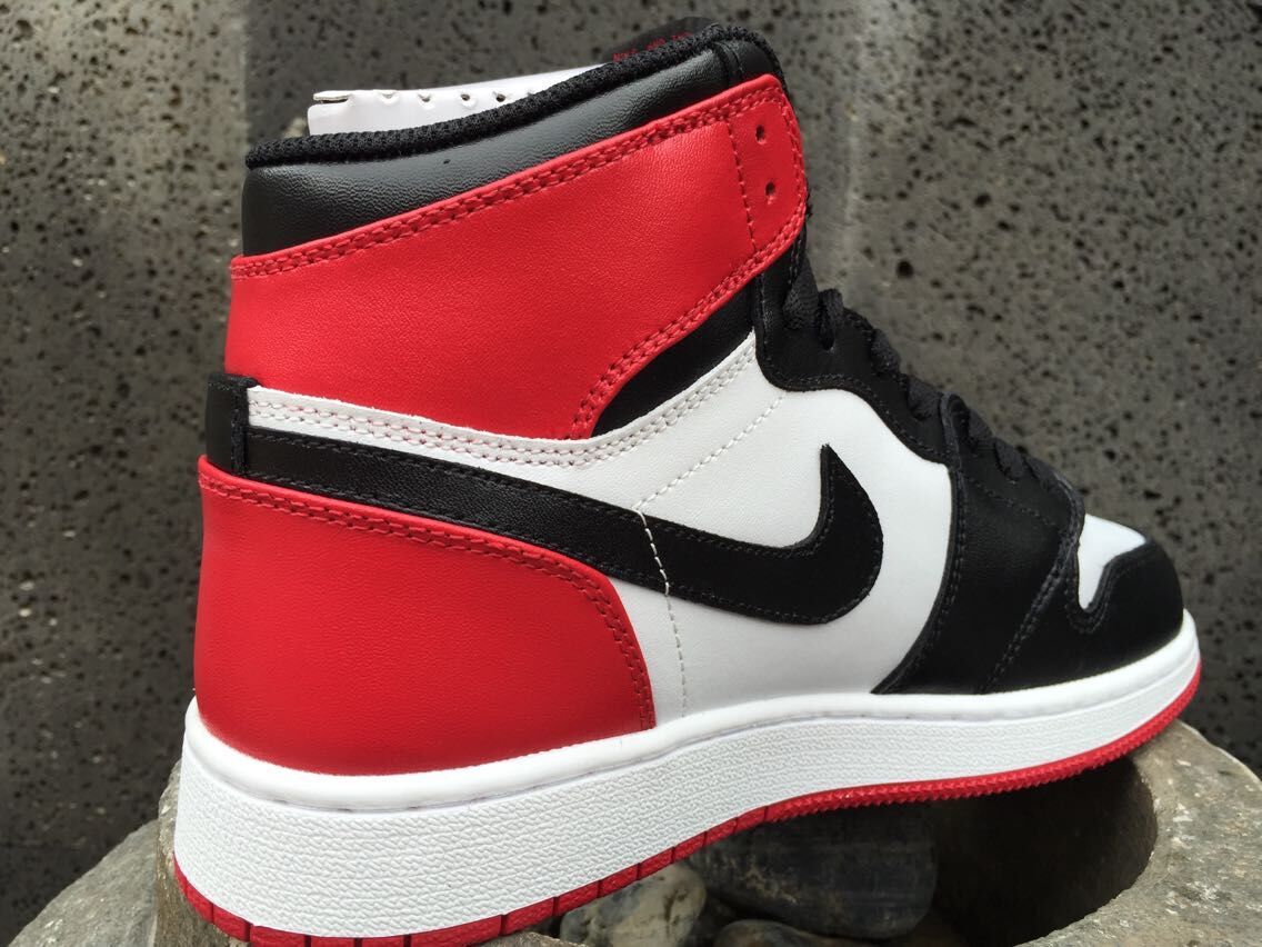 Jordan 1 High Sneakers in Black White Red - product image from the listing.