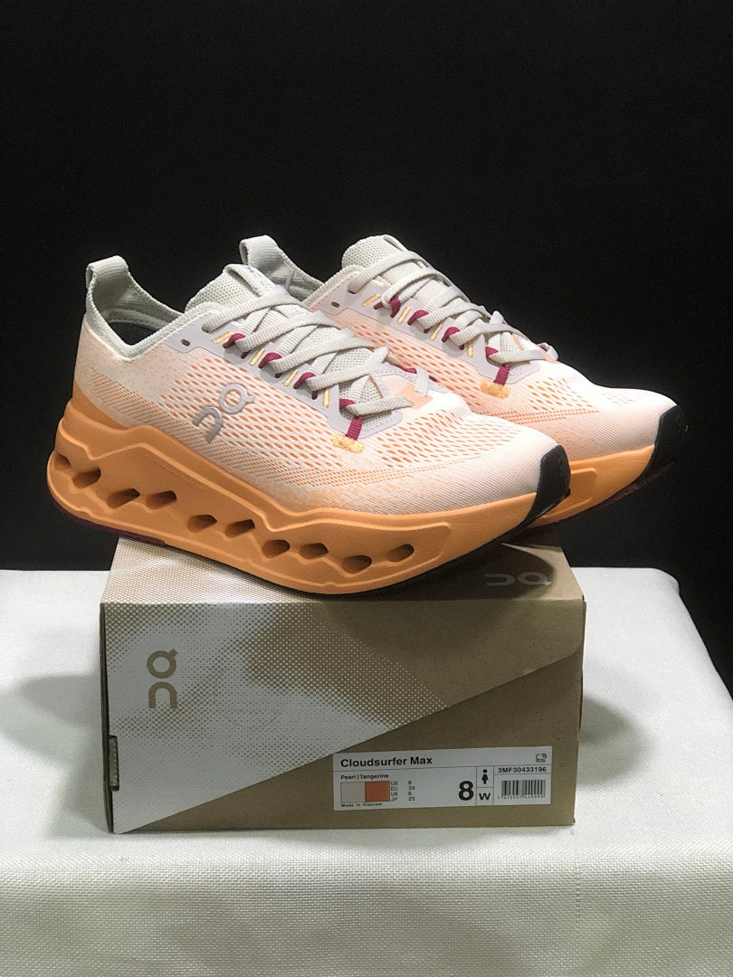 On Cloudsurfer Max Shoes for Running in Pearl and Tangerine - product image from the listing.
