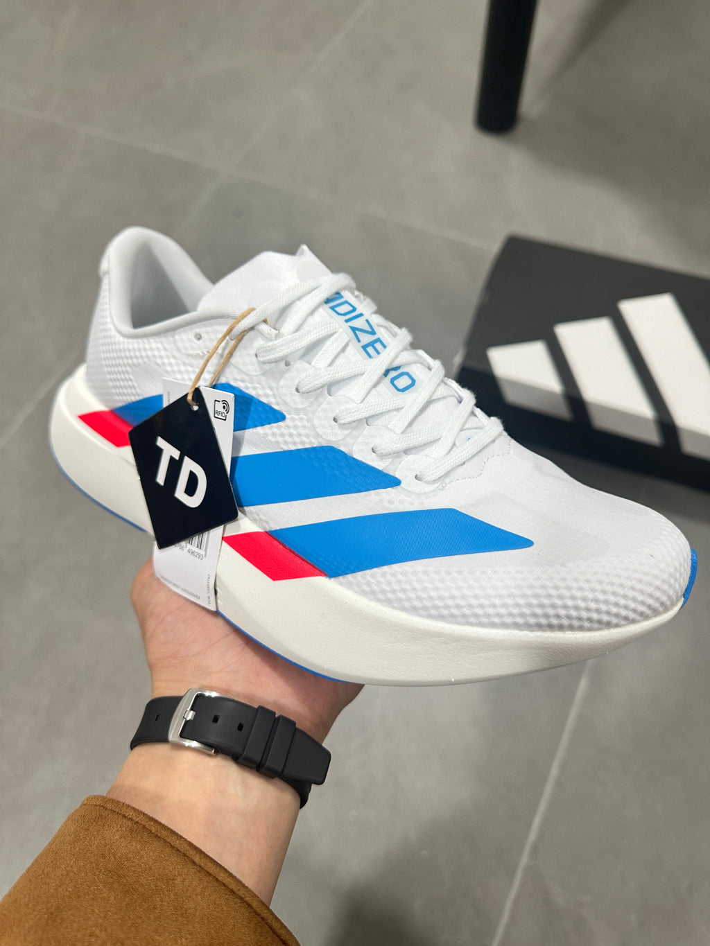 Adidas Lightstrike Pro Running Shoes in White Blue Red KJ3596 - product image from the listing.