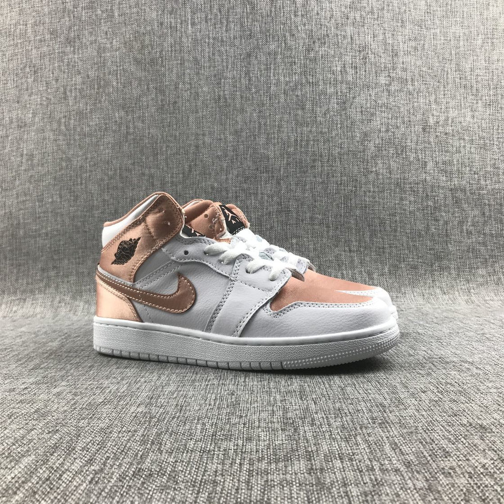 Women's Jordan 1 Mid Rose Gold Silk Sneakers 555112-190 - product image from the listing.