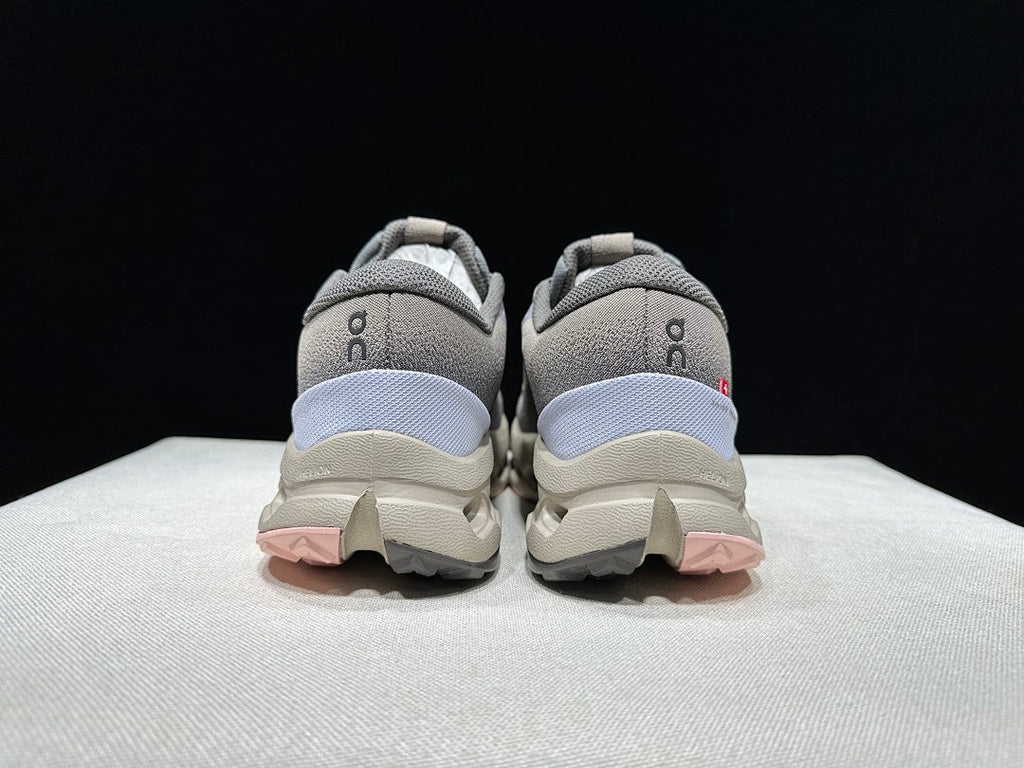 On Cloudsurfer Trail 2 Waterproof Trail Shoes Pink/Brown in Grey - product image from the listing.