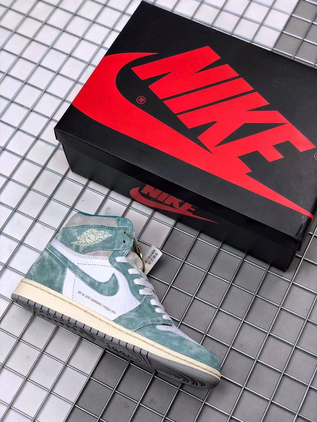 Air Jordan 1 High OG Teal and White Sneakers - product image from the listing.