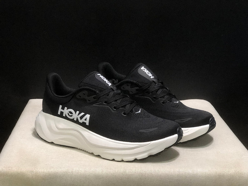 HOKA Arahi 8 Running Shoes in Black and White - product image from the listing.