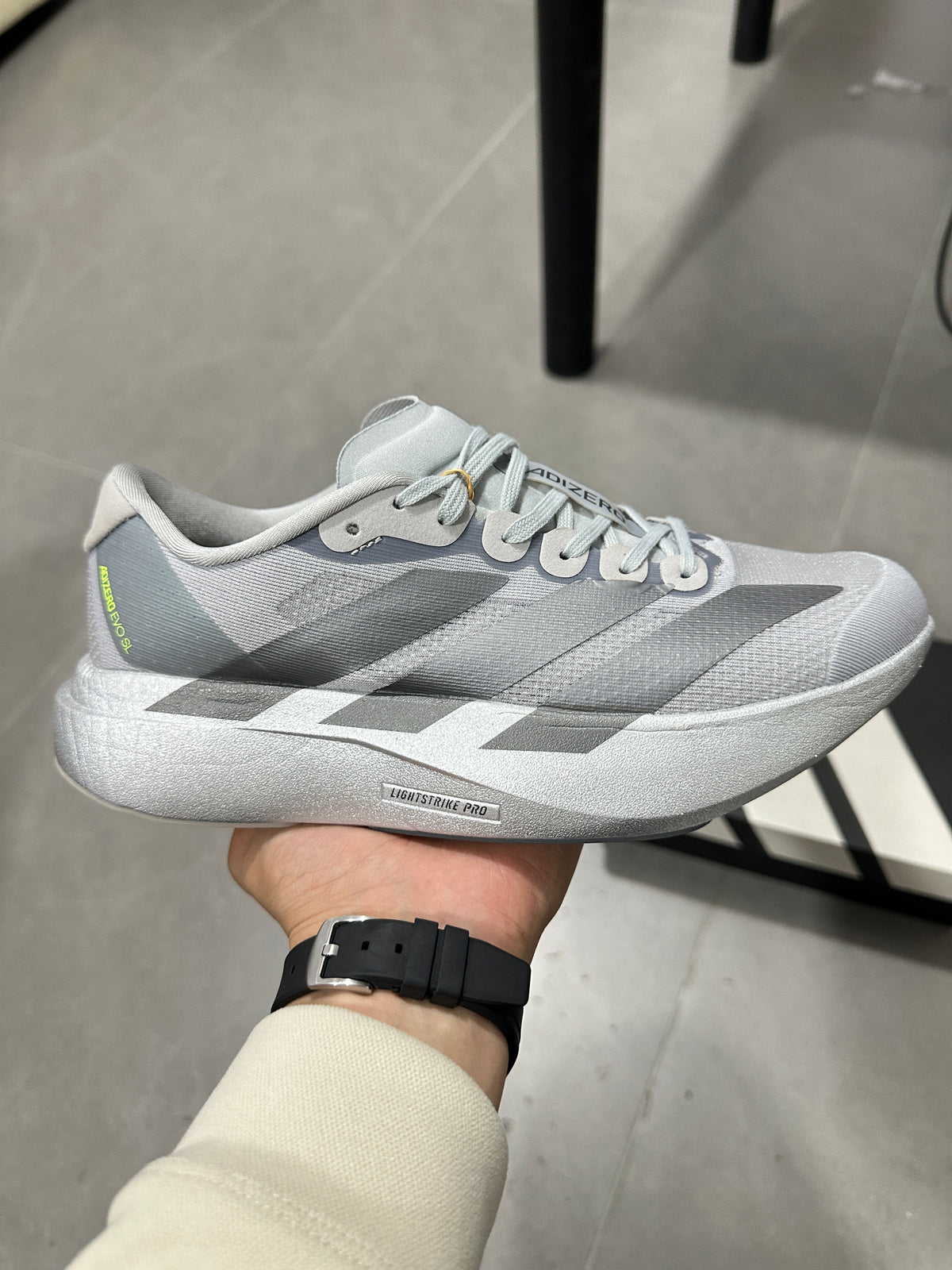 adidas Adizero Evo SL Running Shoes in Light Grey - product image from the listing.