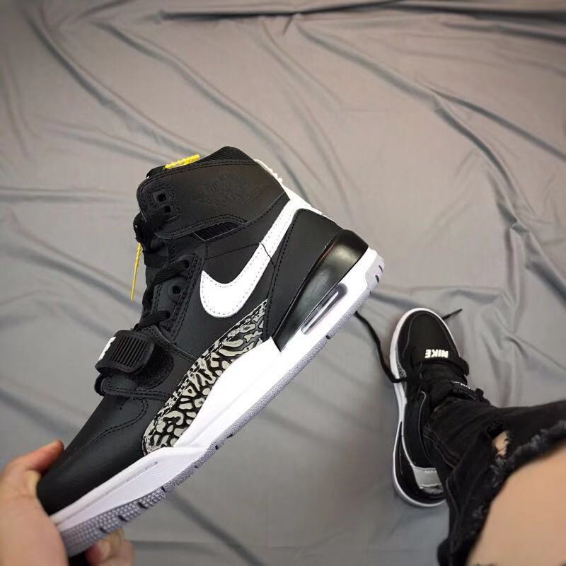Air Jordan Legacy 312 High-Top Sneakers in Black and White - product image from the listing.