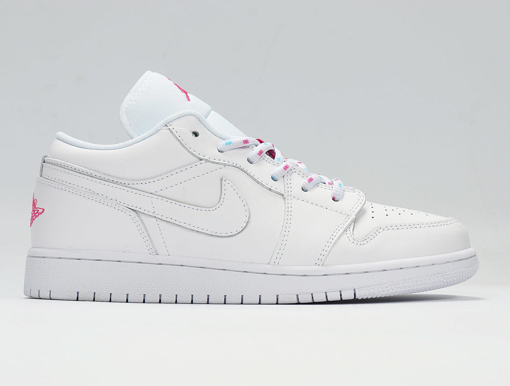 Air Jordan 1 Low White and Pink Sneakers - product image from the listing.