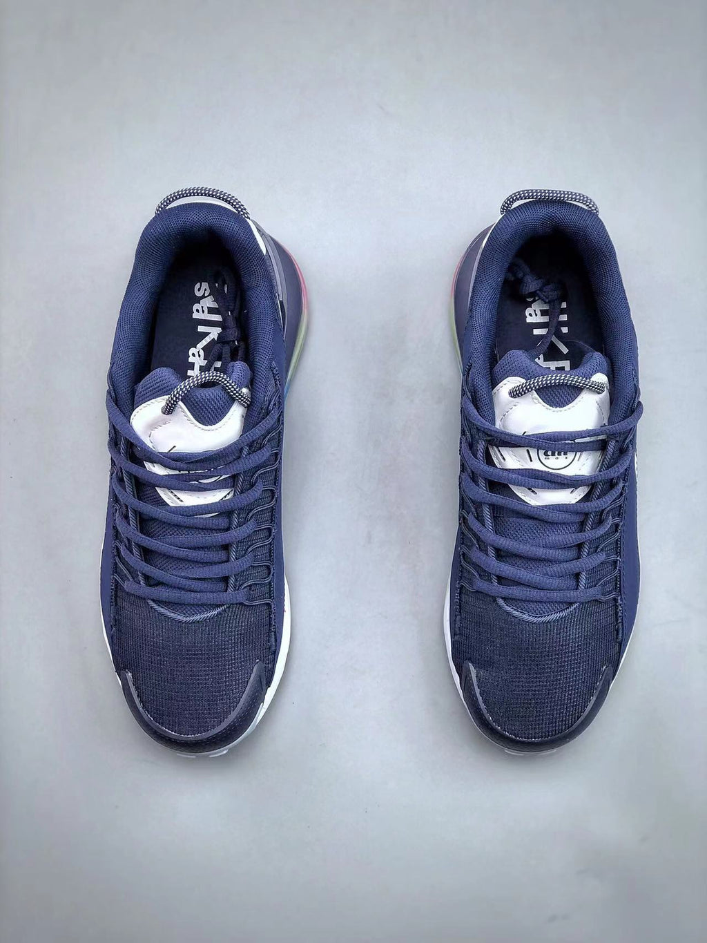 Navy and White Nike Air Max 270 React Sneakers - product image from the listing.